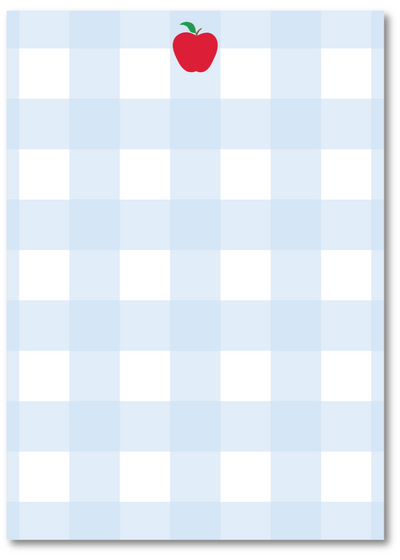 Notepad with blue and white checkered pattern and red apple on top