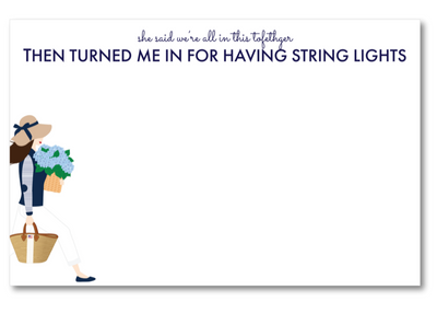 Note card with a cartoon character holding flowers and text on a white background