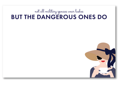 Note card with a woman wearing a hat and sunglasses, text 'not all military spouses wear lashes BUT THE DANGEROUS ONES DO' on a white background.