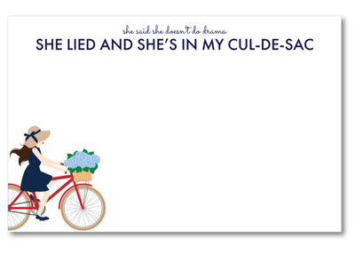 Card with illustration of a woman on a bike and text 'She lied and she's in my cul-de-sac' on a white background
