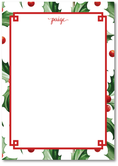 Notepad with holly leaf and berry design on a white background