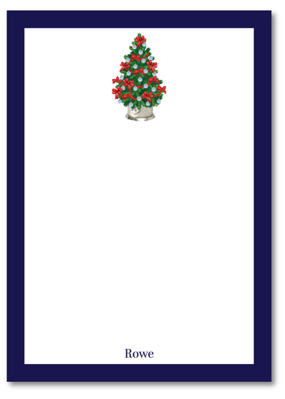 Notepad with a Christmas tree design and the name 'Rowe' on a white background