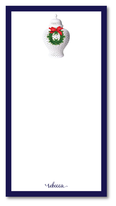 Notepad with a decorative Christmas design on a white background