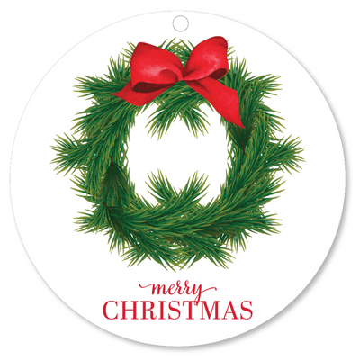 Christmas wreath gift tag with red bow and 'Merry Christmas' text on a white background