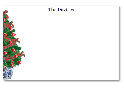 Christmas-themed notepad with a decorative tree design on a white background.
