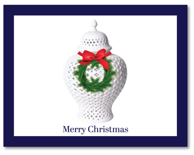 White decorative vase with a Christmas wreath and red bow on a white background