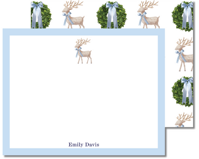 Note card with reindeer and wreath design on a white background