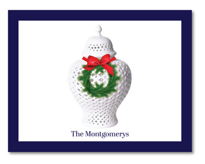 Preppy ginger jar with wreath and bow on a white card with 'The Montgomerys' text, framed by a blue border.