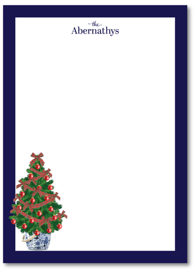 Christmas-themed stationery with a tree design and 'the Abernathys' text.