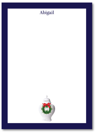 Letterhead with a decorative urn design and the name 'Abigail' at the top, framed with a blue border.